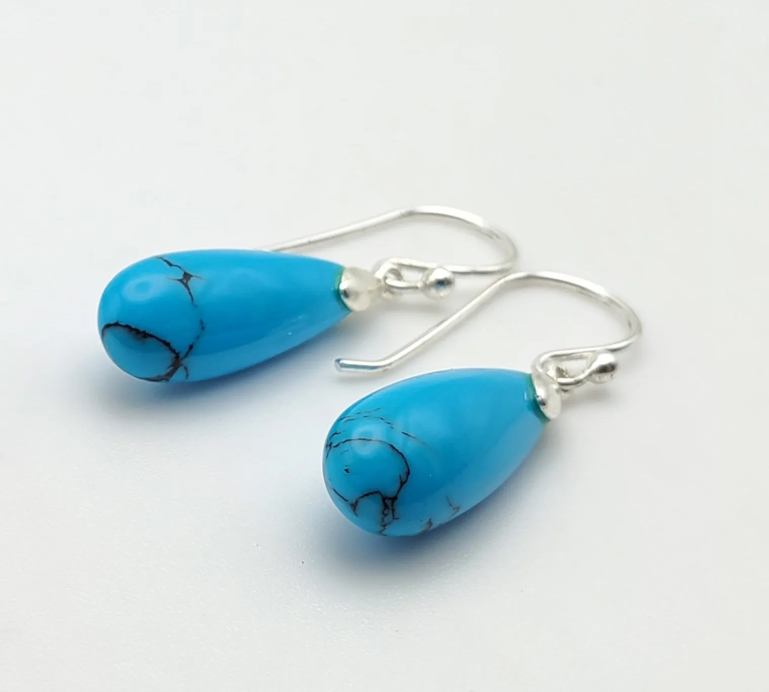 Carved Turquoise Sterling Silver Dangle Earrings